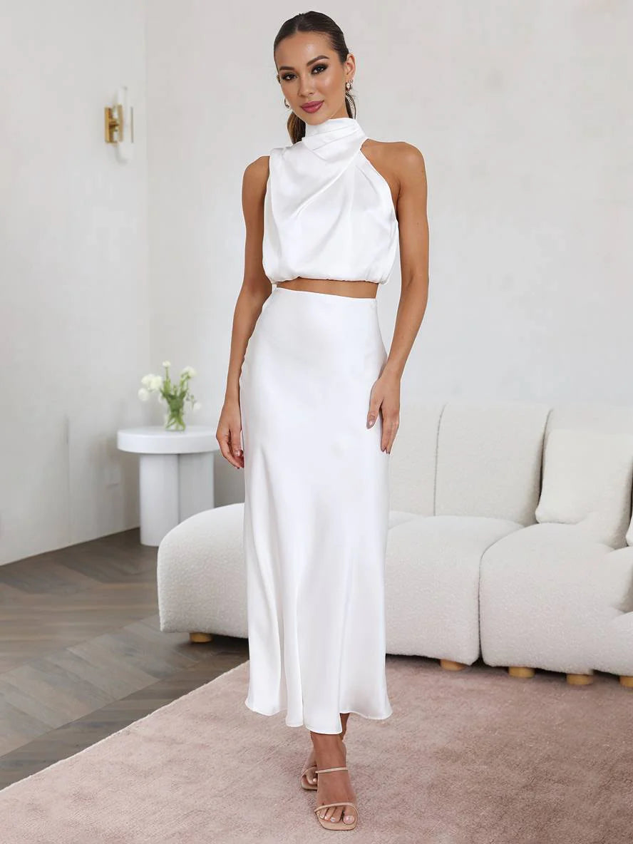 Completo da donna in due pezzi con scollo all'americana e gonna lunga