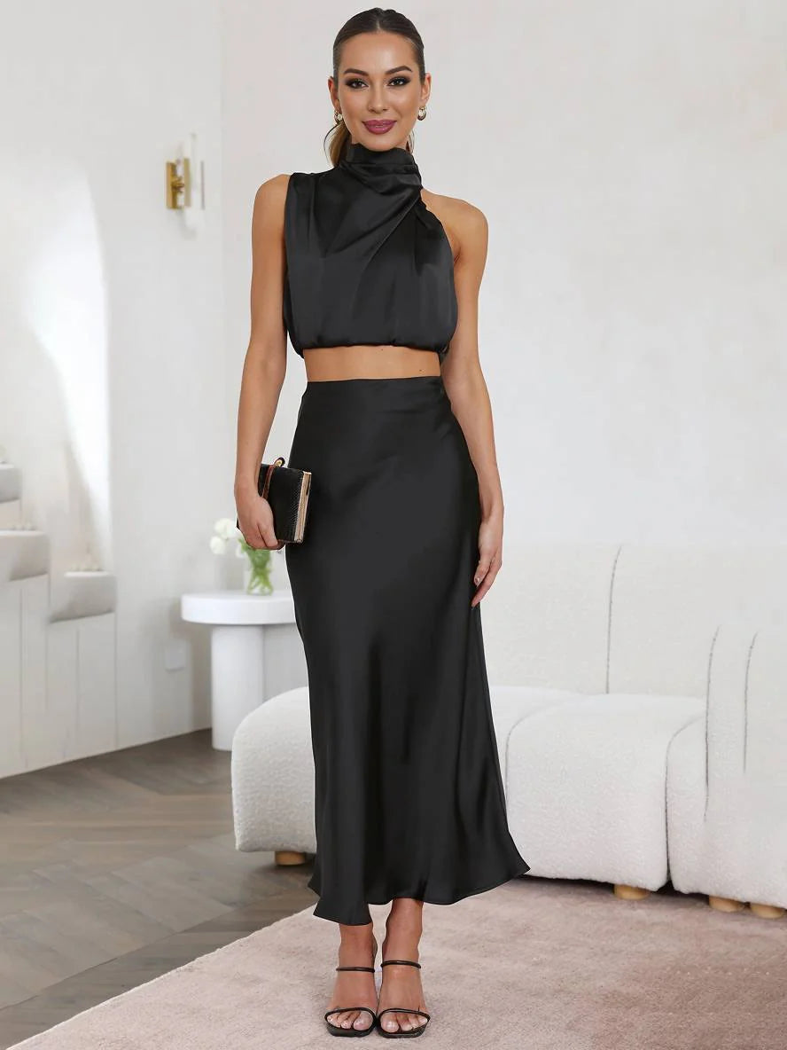 Completo da donna in due pezzi con scollo all'americana e gonna lunga