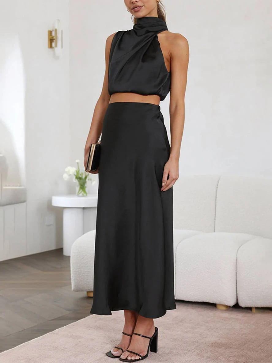 Completo da donna in due pezzi con scollo all'americana e gonna lunga