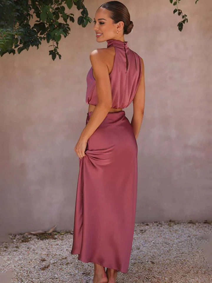 Completo da donna in due pezzi con scollo all'americana e gonna lunga