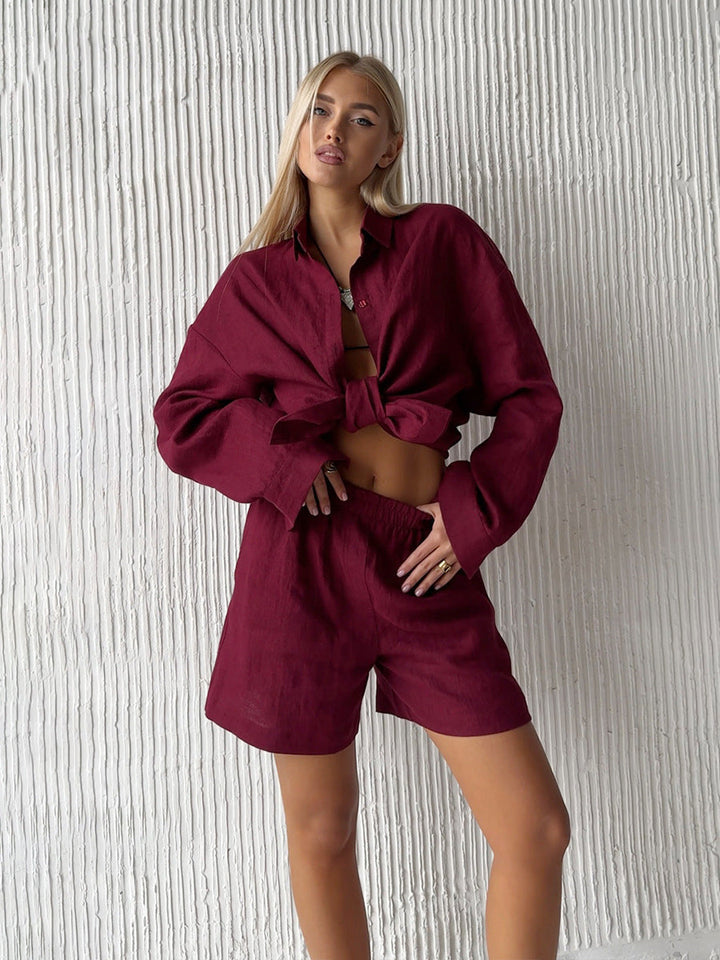 Completo da donna con bottoni e maniche lunghe