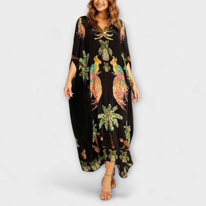 Linda – Wunderschönes Kleid mit asymmetrischen Schultern und tropischem Kokospalmen-Print