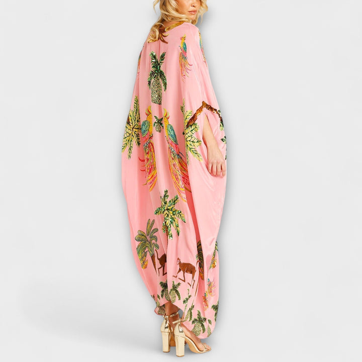 Linda – Wunderschönes Kleid mit asymmetrischen Schultern und tropischem Kokospalmen-Print
