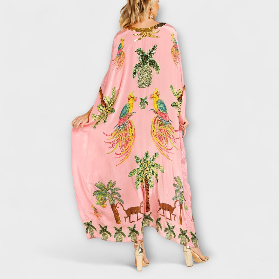 Linda – Wunderschönes Kleid mit asymmetrischen Schultern und tropischem Kokospalmen-Print