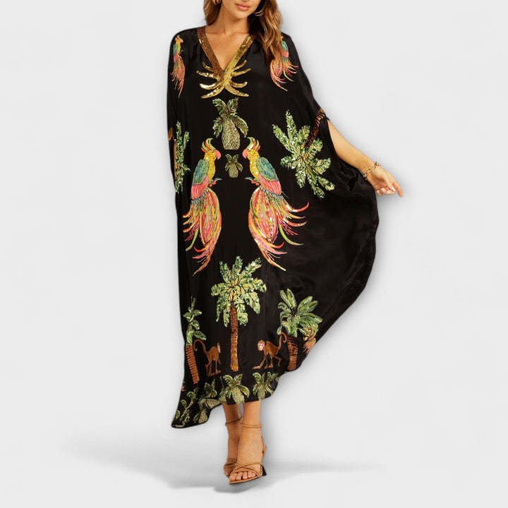 Linda – Wunderschönes Kleid mit asymmetrischen Schultern und tropischem Kokospalmen-Print