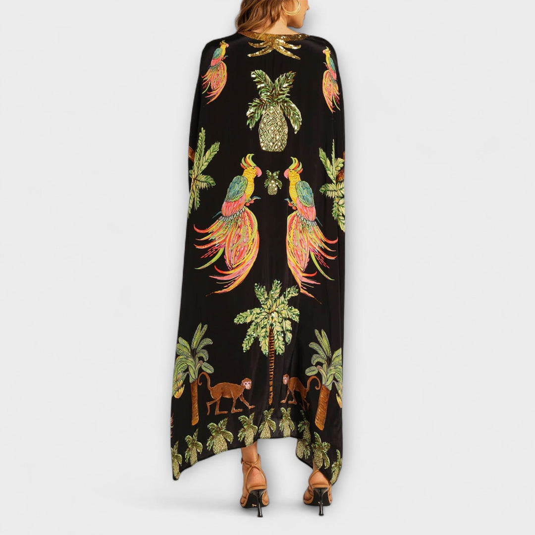 Linda – Wunderschönes Kleid mit asymmetrischen Schultern und tropischem Kokospalmen-Print