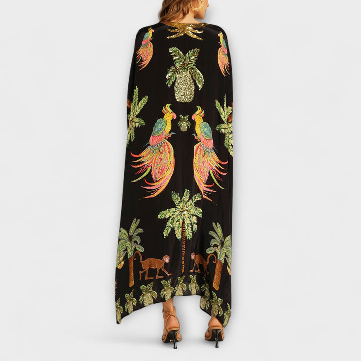Linda – Wunderschönes Kleid mit asymmetrischen Schultern und tropischem Kokospalmen-Print